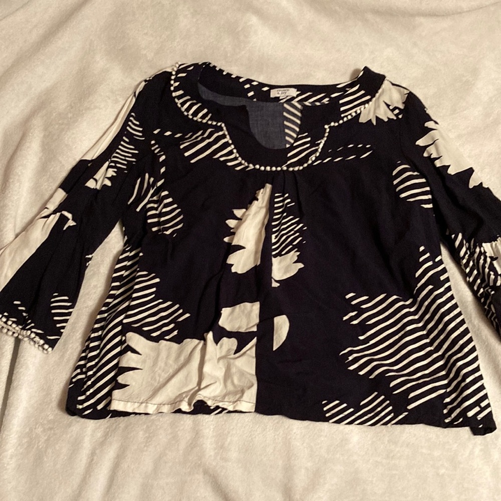 A dark blue and white blouse